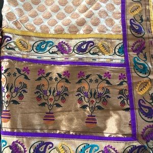 Six yard semi Banarasi sari with stitched blouse.